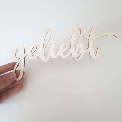 Schriftzug "geliebt", Holzschrift, Text aus Holz, Wandbehang, Wanddeko